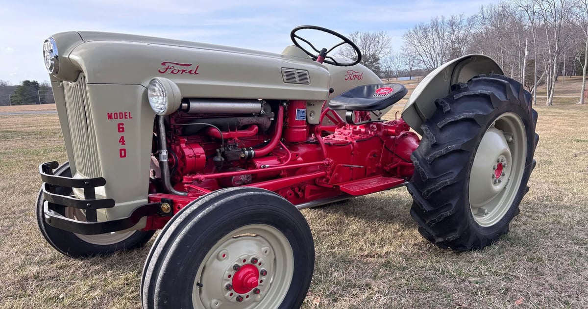 Grandson preserves grandfather’s handprint on restored tractor