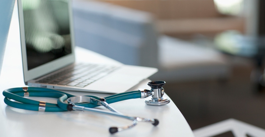laptop and stethoscope-on-desk