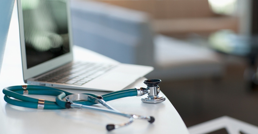 laptop and stethoscope-on-desk laptop and stethoscope-on-desk