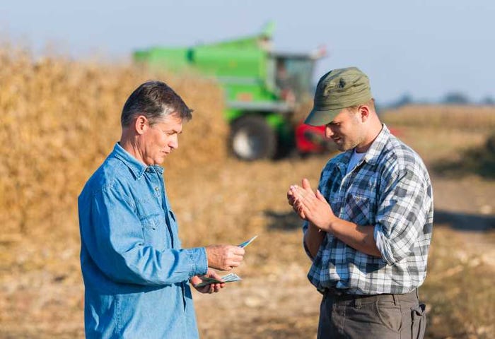 two farmers talking fotokostic getty images!.jpg two farmers talking fotokostic getty images!.jpg