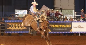 Cable Wareham of Whiting showing his saddle bronc riding talents at the National High School Rodeo Finals 