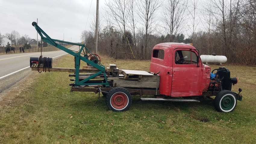 vintage red truck with mailbox in the bed