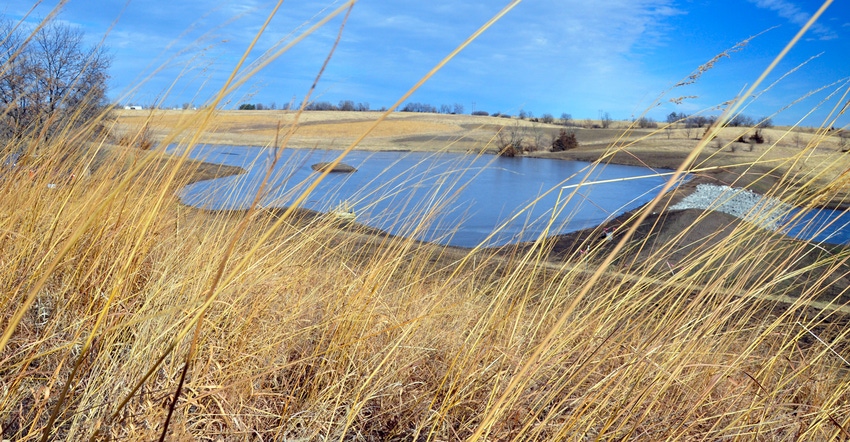 Panoramic view of soil conservation efforts around a wetland area