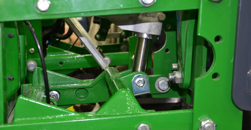upclose view of hydraulic cylinder on corn planter