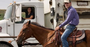 Clara in cab of a truck and Ty Lauritsen on horse