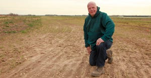 Allan Zilnicki, a third-generation farmer on Long Island, shown in family’s potato field