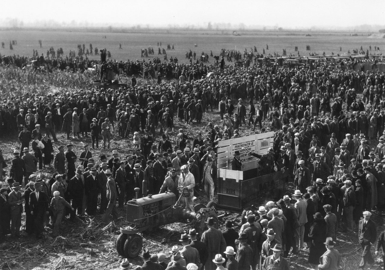  Black and white photo of large crowd gathered in field
