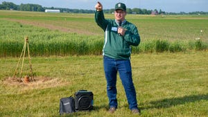 Dennis Pennington, Michigan State University wheat systems specialist takes questions during the Michigan Wheat Tour