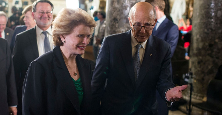 Sen. Debbie Stabenow and Sen. Pat Roberts enter the House chamber before the State of the Union address in 2019.