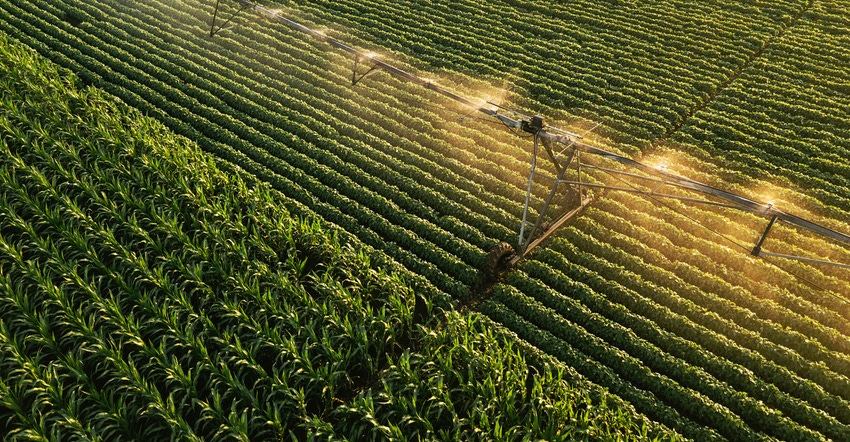 Aerial view of irrigation system in adjacent soybean and corn fields