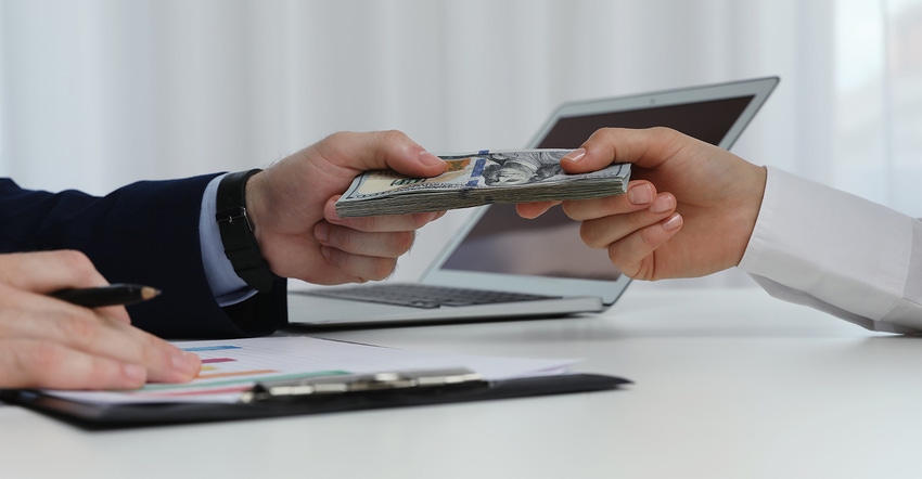 lender handing over money