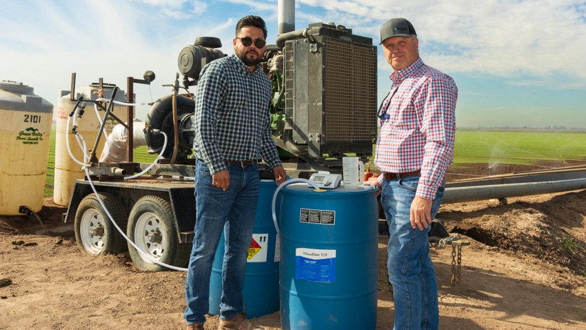 Leo Velasco, left, food safety director for Top Flavor Farms and Jay Sughroue, area manager, BioSafe Systems.
