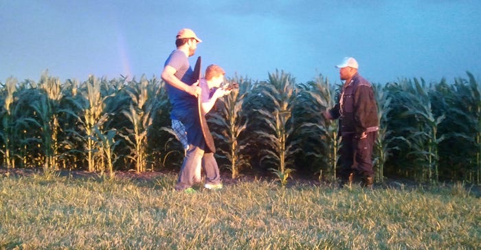Todd Stevens (right in photo) raps to Royal Soil as he disappears through the sunset into the corn, similar to the ending of Todd Stevens (right in photo) raps to Royal Soil as he disappears through the sunset into the corn, similar to the ending of