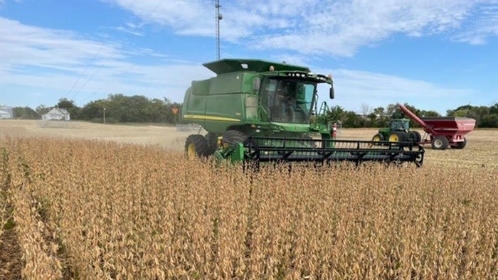 John Deere  harvester in field