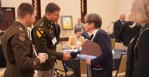 Col. Timothy P. Hudson, commander of the U.S. Army Corps of Engineers, Tulsa District, talking with Kansas Governor Laura Kel