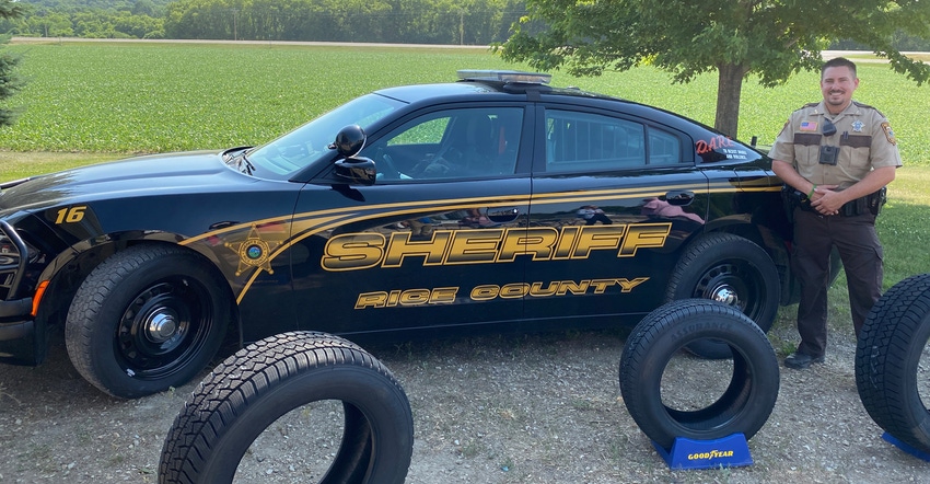 Rice County sheriff’s deputy Derek Estrem shows off his new set of soy-based tires on his 2019 Dodge Charger 