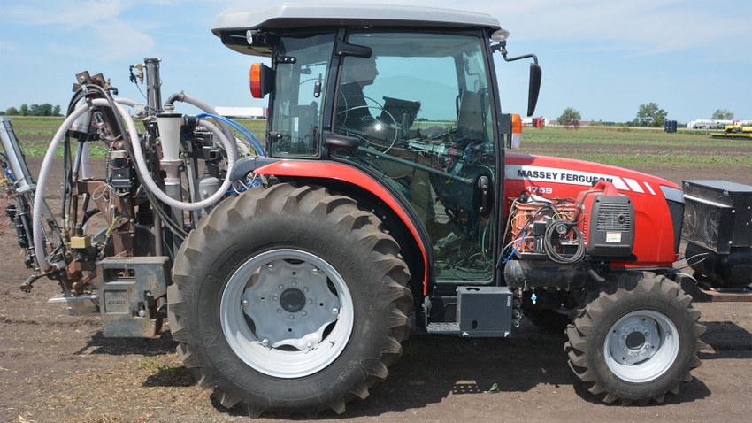 A tractor pulling a soil sampler prototype 