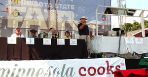 MFU president Doug Peterson and a food panel at the Minnesota Cooks show in 2012 at the State Fair