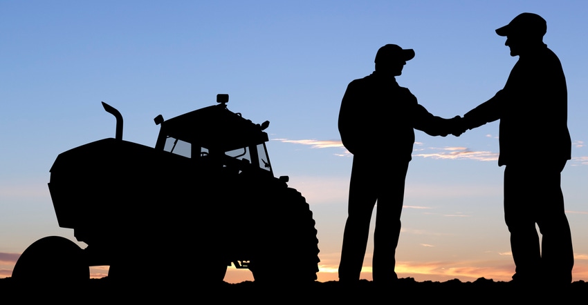 silhouette of farms shaking hands