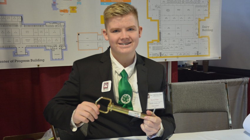 4-H student holding hitch pin