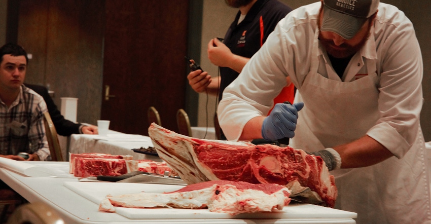 Ben Peterson carving cuts of beef Ben Peterson carving cuts of beef