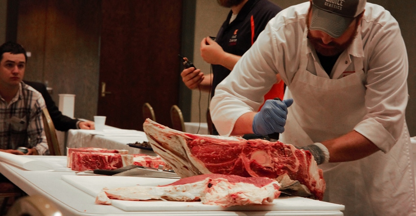 Ben Peterson carving cuts of beef