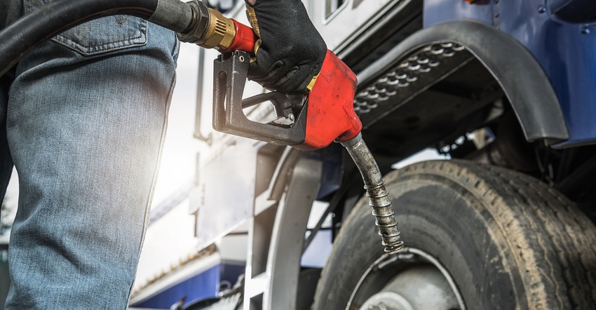 Semi Truck Driver About to Refuel His Tractor Truck with Diesel