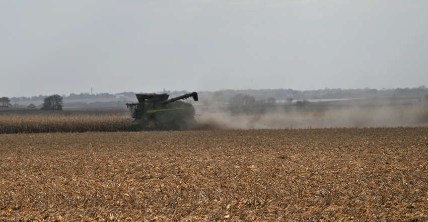Combine in field during harvest Combine in field during harvest