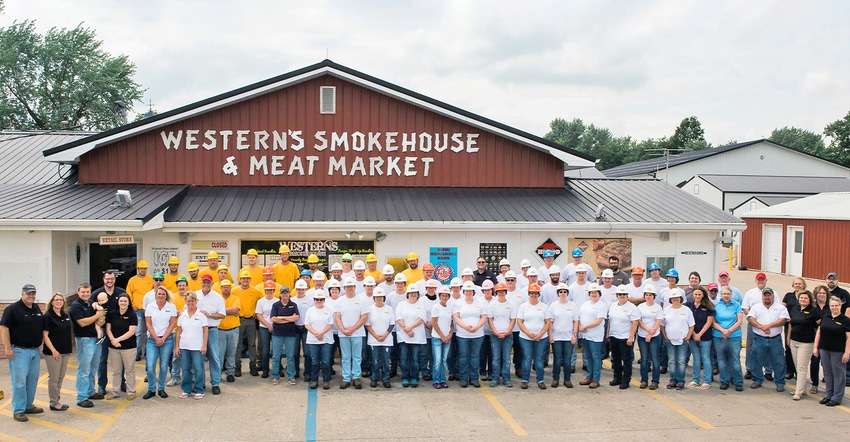 Employees of Western’s Smokehouse Production, LLC, in Greentop, Mo.,