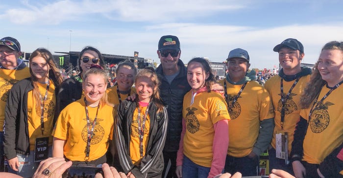 NASCAR driver Clint Bower  surrounded by members of the North Lyon County FFA Chapter from Allen and the Southern Lyon County FFA chapter from Olpe