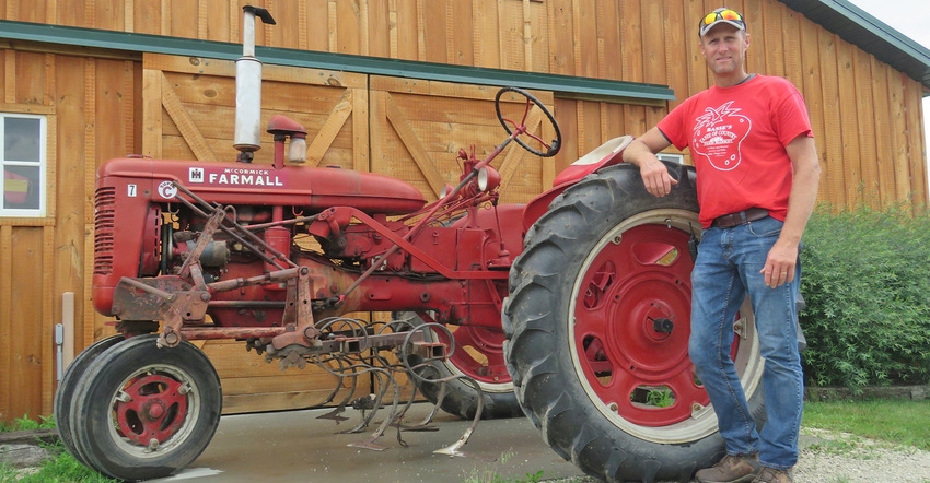Roger Basse and Farmall Super C tractor