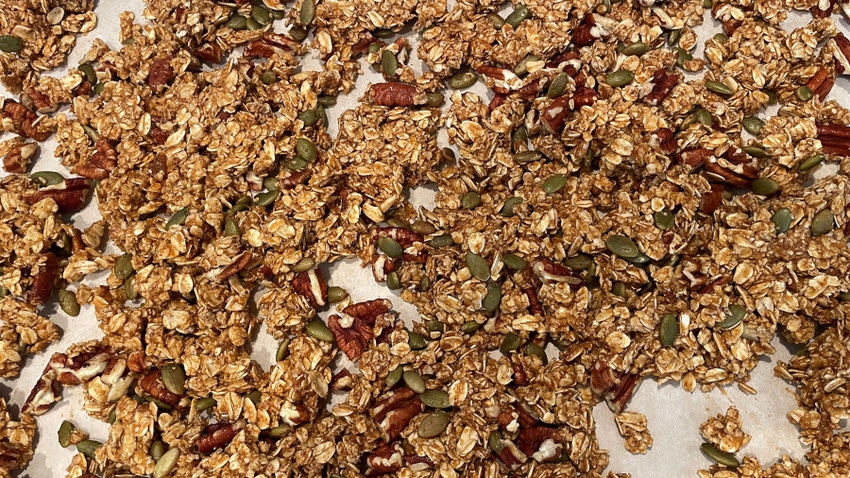  A close-up of granola made up of seeds, nuts and oats