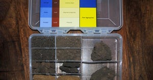 A soil health kit in a plastic container 