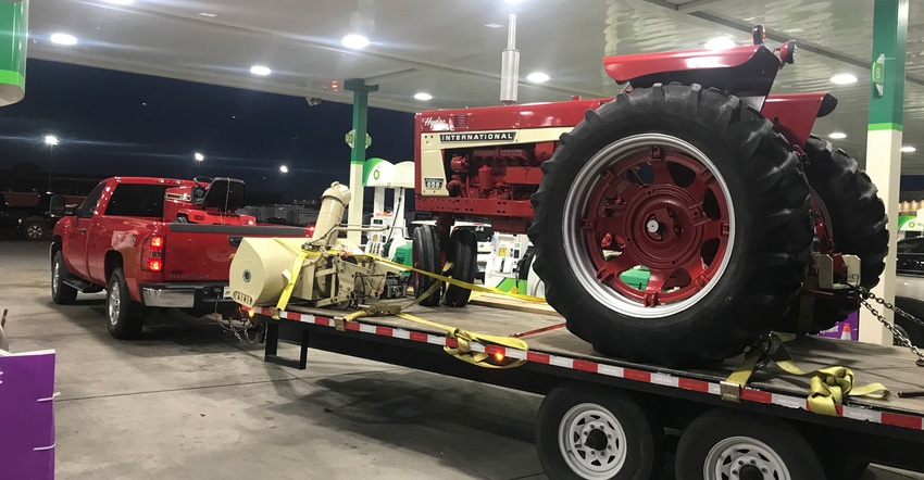 International 656 tractor on trailer bed International 656 tractor on trailer bed