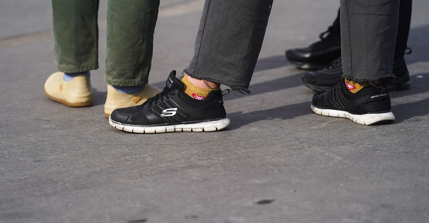 kechers sneakers are seen, outside Chanel, during Paris Fashion Week - Womenswear Fall/Winter 2020/2021 on March 03, 2020 in 