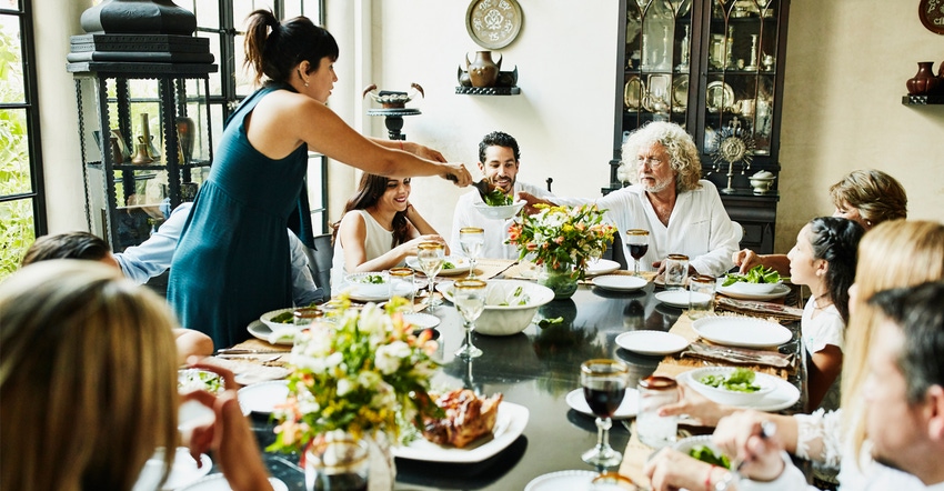 Family having meal at dining room table