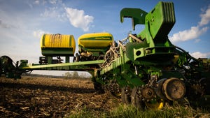 up-close view of John Deere planter in field
