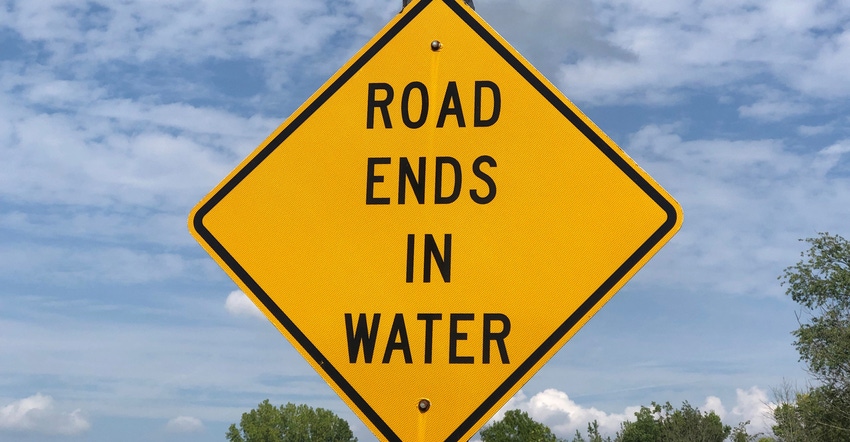 road ends in water sign