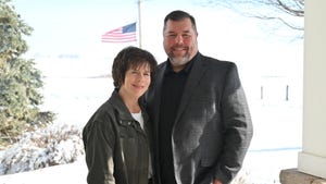 Denise and Todd Wiley in pig barn