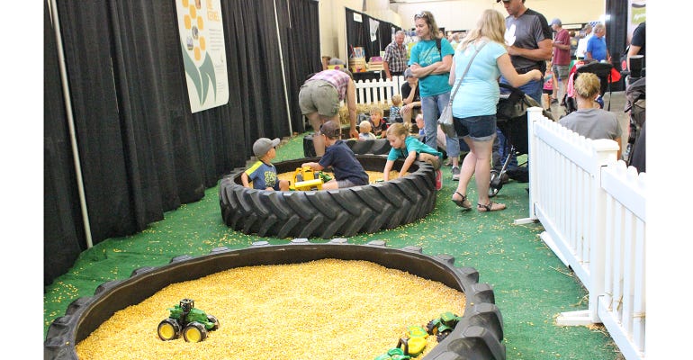 kids playing in corn