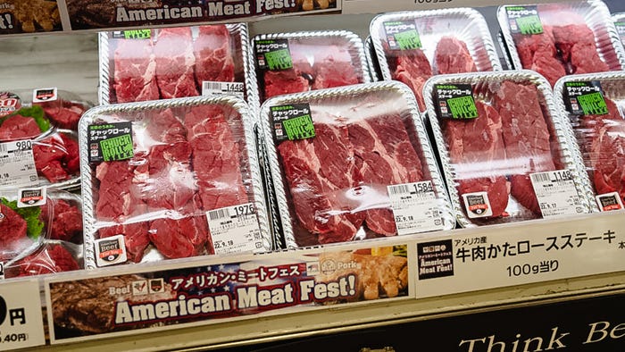 Packaged beef in refrigerator case