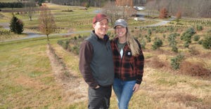 Larry and Ashley Latta at their Christmas tree farm