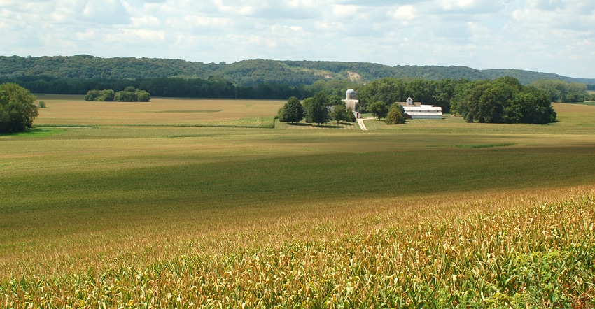 scenic Minnesota field, farmstead and tree line