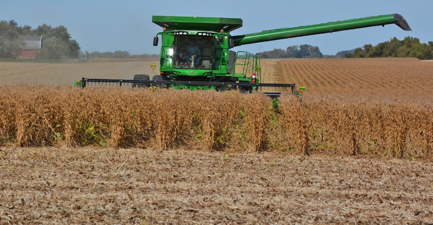 John Deere combine harvesting soybeans