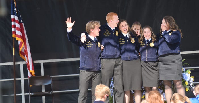 The 2021-2022 Illinois FFA state officers celebrate their election on stage