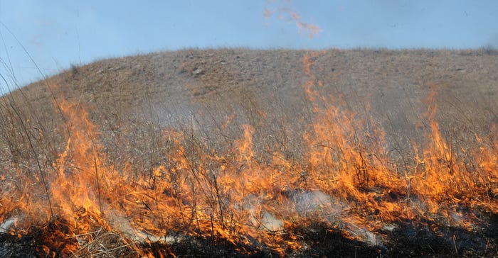 Miles of flames licking across the countryside in the Flint Hills of Kansas in April