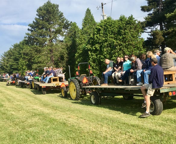 Farmers rotated through several sessions during the Michigan Wheat Program’s summer field day learning first hand about disease management, weed control, planting technologies and more