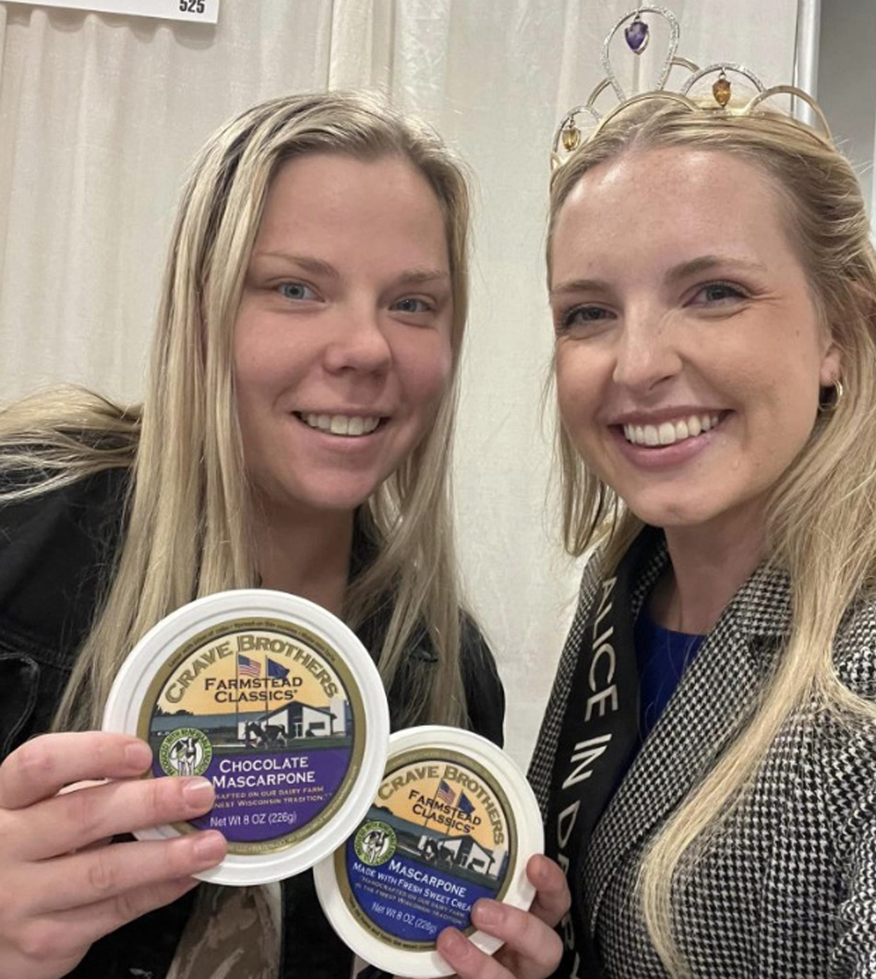 two young ladies holding containers of Crave Brothers Chocolate Mascarpone