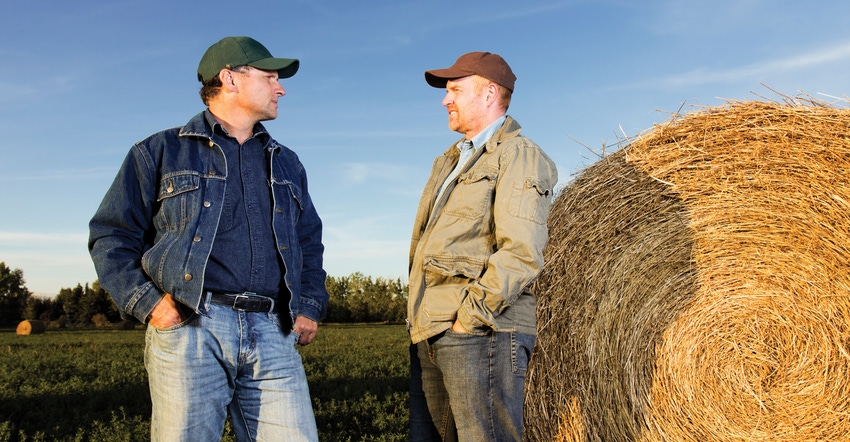 two farmers talking