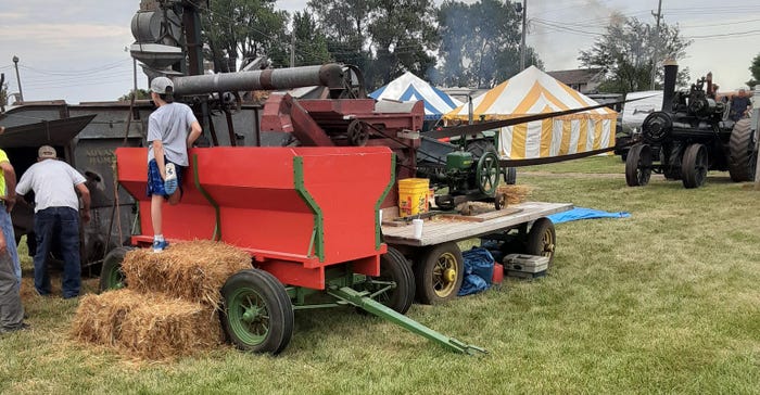 wheat threshing at Howard County Fair's Pioneer Village in 2020